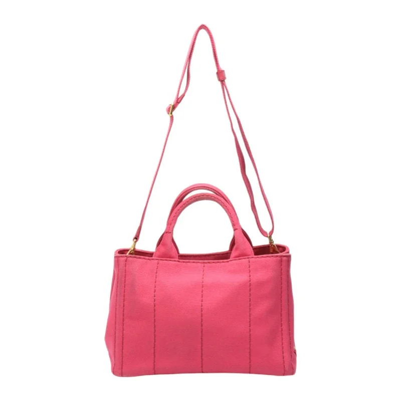 Prada bags with a front - zip pocket for small items like cards and keysPRADA Canapa Tote