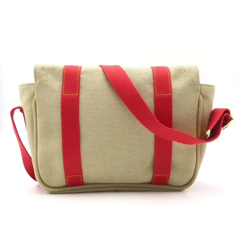 Louis Vuitton Twist bags with the iconic LV - turnlock closureLOUIS VUITTON Buzzus PM Beige Red canvas Antigua M40041