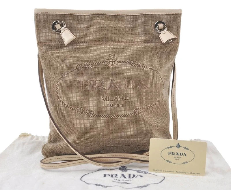 Ladies Prada Re - Edizione 2005 bags with a star - shaped charm for a playful touchAuthentic PRADA LOGO JACQUARD Canvas Leather Shoulder Bag BT0551 Beige 7005K