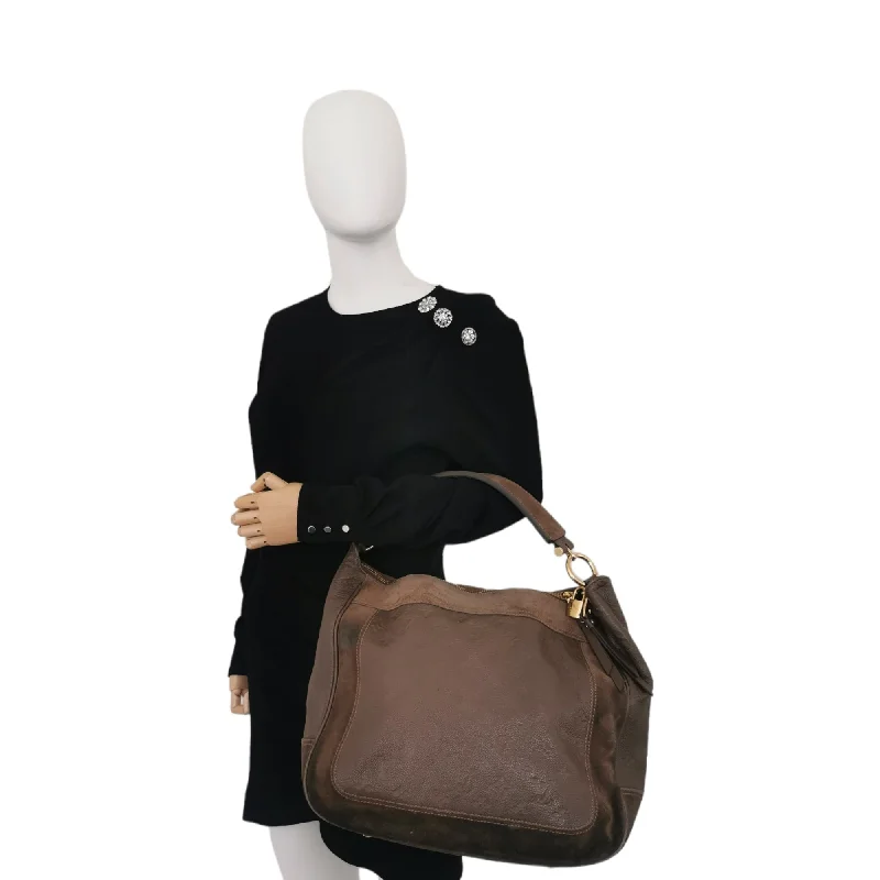 Louis Vuitton Neverfull bags with large capacity for everyday essentialsLouis Vuitton Brown Tote Bag Monogram Empreinte