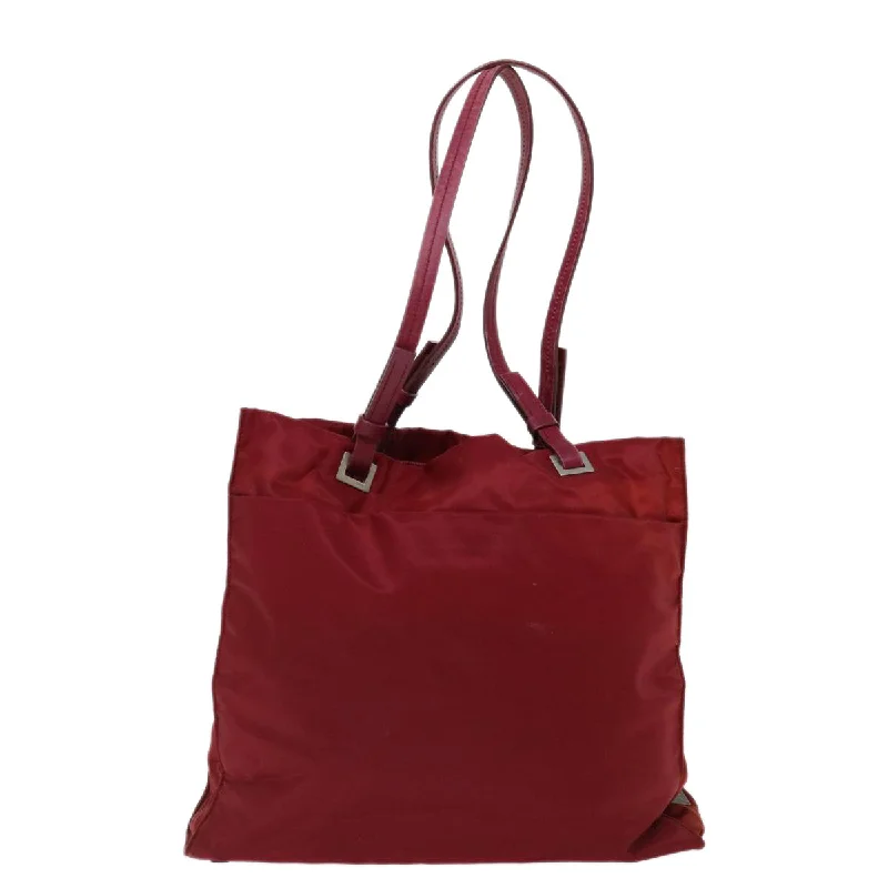 Prada tote bags with a double - handle and shoulder - strap option for easy usePRADA Tessuto Shoulder Bag