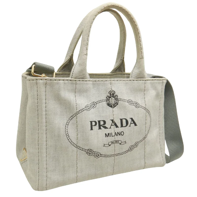 Prada tote bags with a spacious interior and a magnetic - snap closurePRADA Canapa Tote