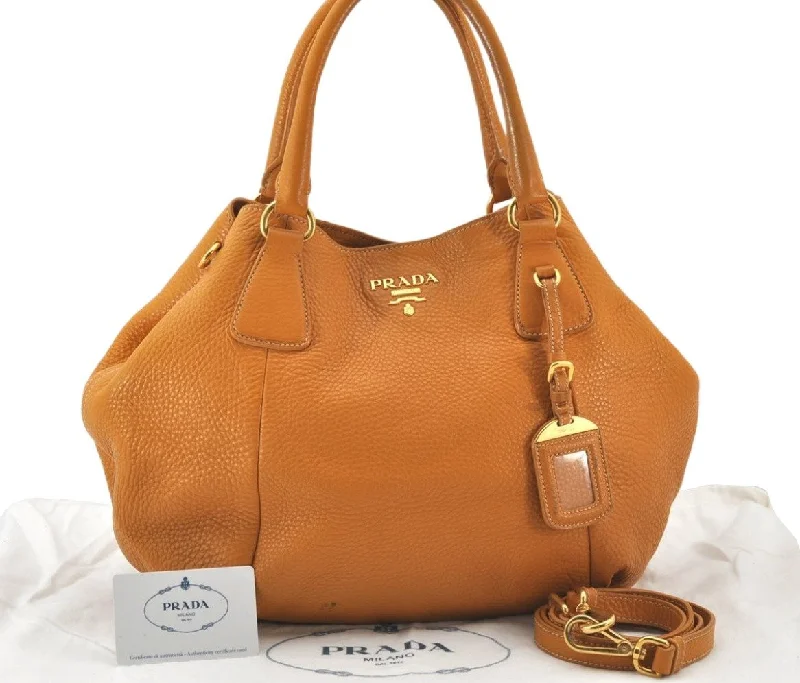 Prada Cleo bags with a contrast - colored interior for visual interestAuthentic PRADA VIT.DAINO Leather 2Way Shoulder Tote Bag BN2343 Orange 6426K