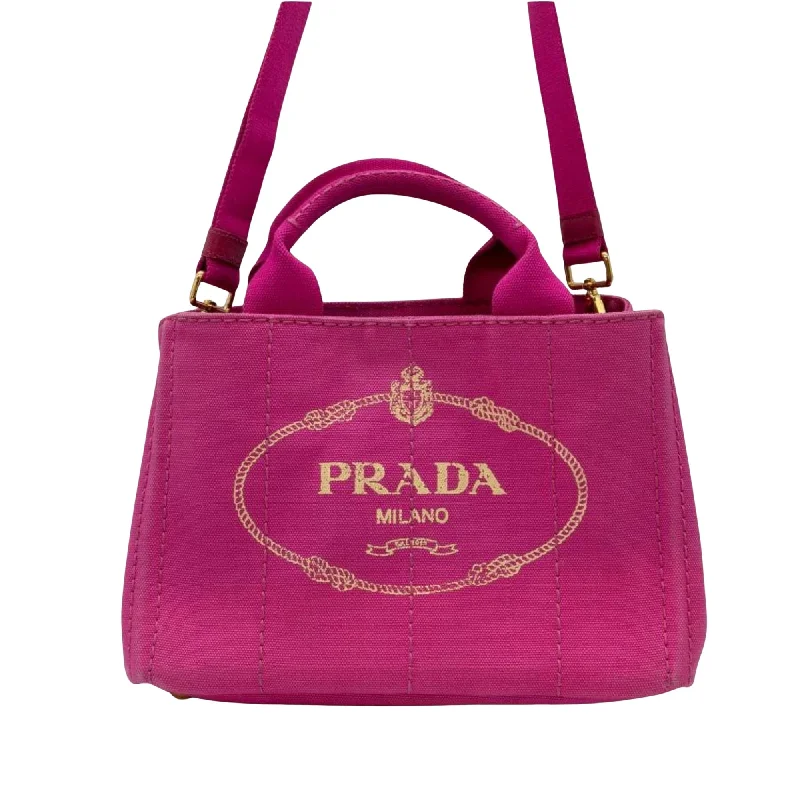 Prada Cleo bags with a curved shape and a chain - link shoulder strapPRADA Canapa Tote