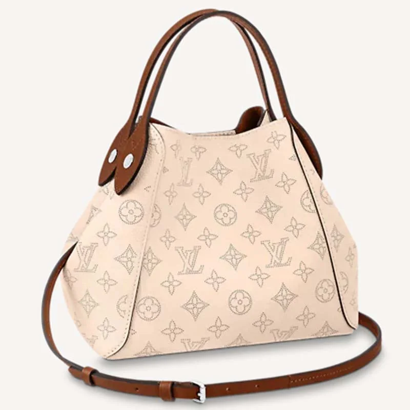 Ladies Louis Vuitton Petite Malle bags in a pastel color for a soft lookLouis Vuitton LV Women Hina PM Bucket Bag Crème Beige Mahina Perforated Calf