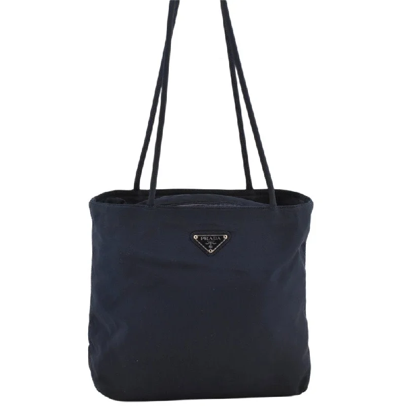 Prada Cahier bags featuring the signature triangular logo plaqueAuthentic PRADA Vintage Nylon Tessuto Shoulder Tote Bag Purse Navy Blue 2823K