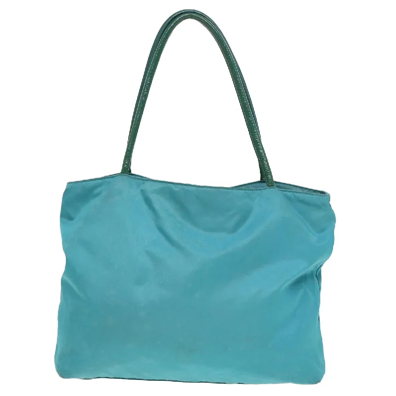 Prada Cleo bags with a contrast - colored interior for visual interestPRADA Shoulder Bag Nylon Turquoise Blue  77836