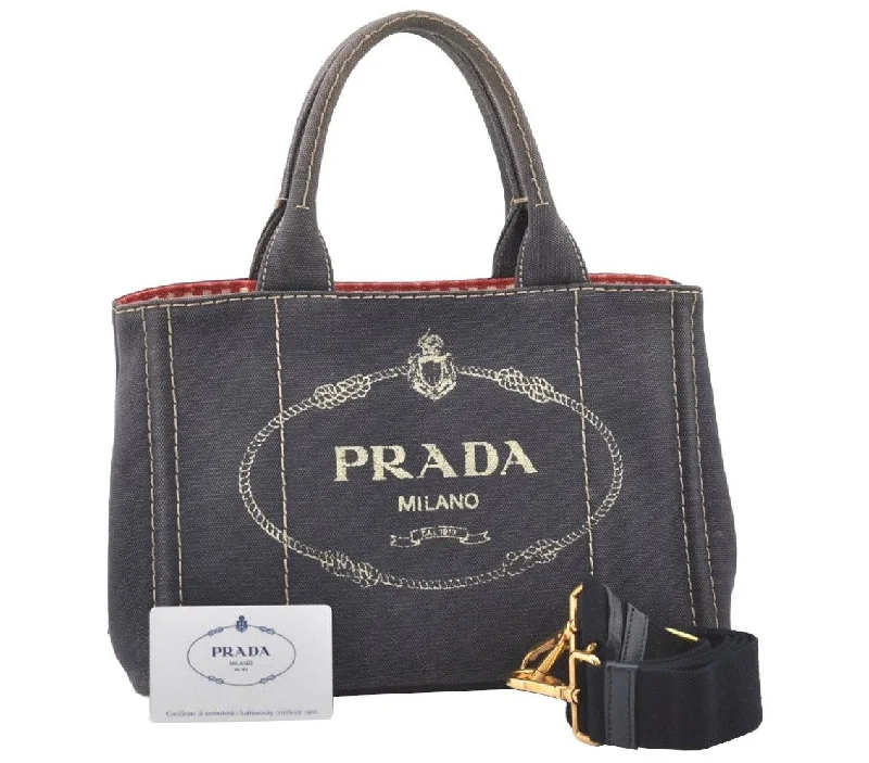 Prada tote bags with a printed Prada logo on the front for brand visibilityAuthentic PRADA CANAPA SS Denim 2Way Shoulder Hand Bag 1BG439 Navy Blue 7921J