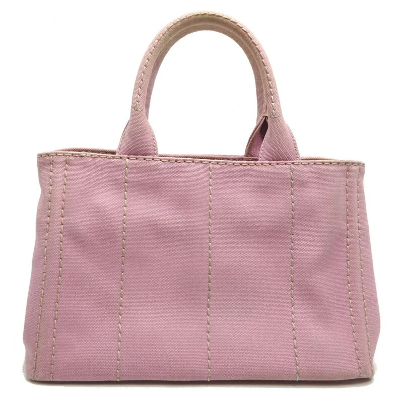 Prada Cleo bags with a contrast - colored interior for visual interestPRADA Canapa Tote