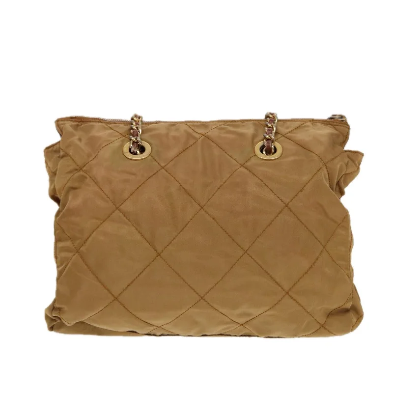 Prada handbags with a perforated leather detail for a unique and breathable designPRADA Chain Shoulder Bag Nylon Brown Gold  bs17234