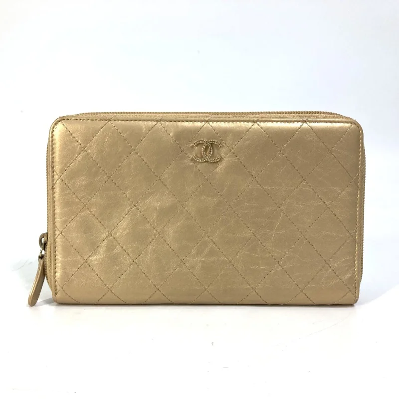 Chanel bags available at online luxury retaileChanel CC Mark CC Zip Around Long Wallet Gold