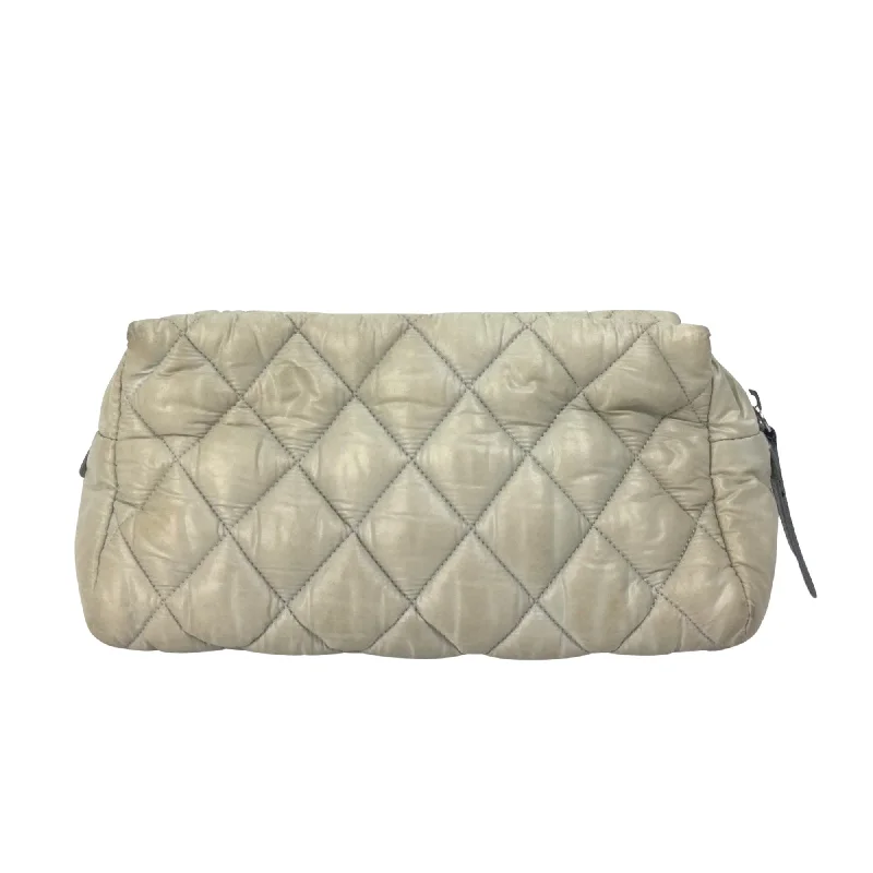 Chanel bags with iconic gold chainsCHANEL Coco Cocoon Clutch Bag