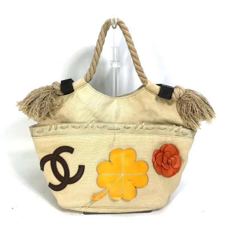 Chanel bags with gold, silver, and pearl accentsChanel CC Mark Clover Flower Tote Bag Shoulder Bag Beige