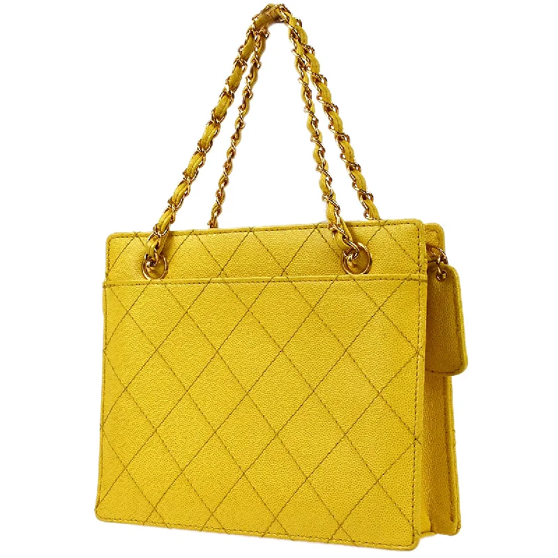 Chanel bags available at online luxury retaileCHANEL Chain Tote Handbag Yellow Caviar 97762