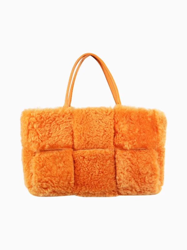 Sequined and Beaded Hermes Bags for Glamorous EventsOrange faux-fur tote bag